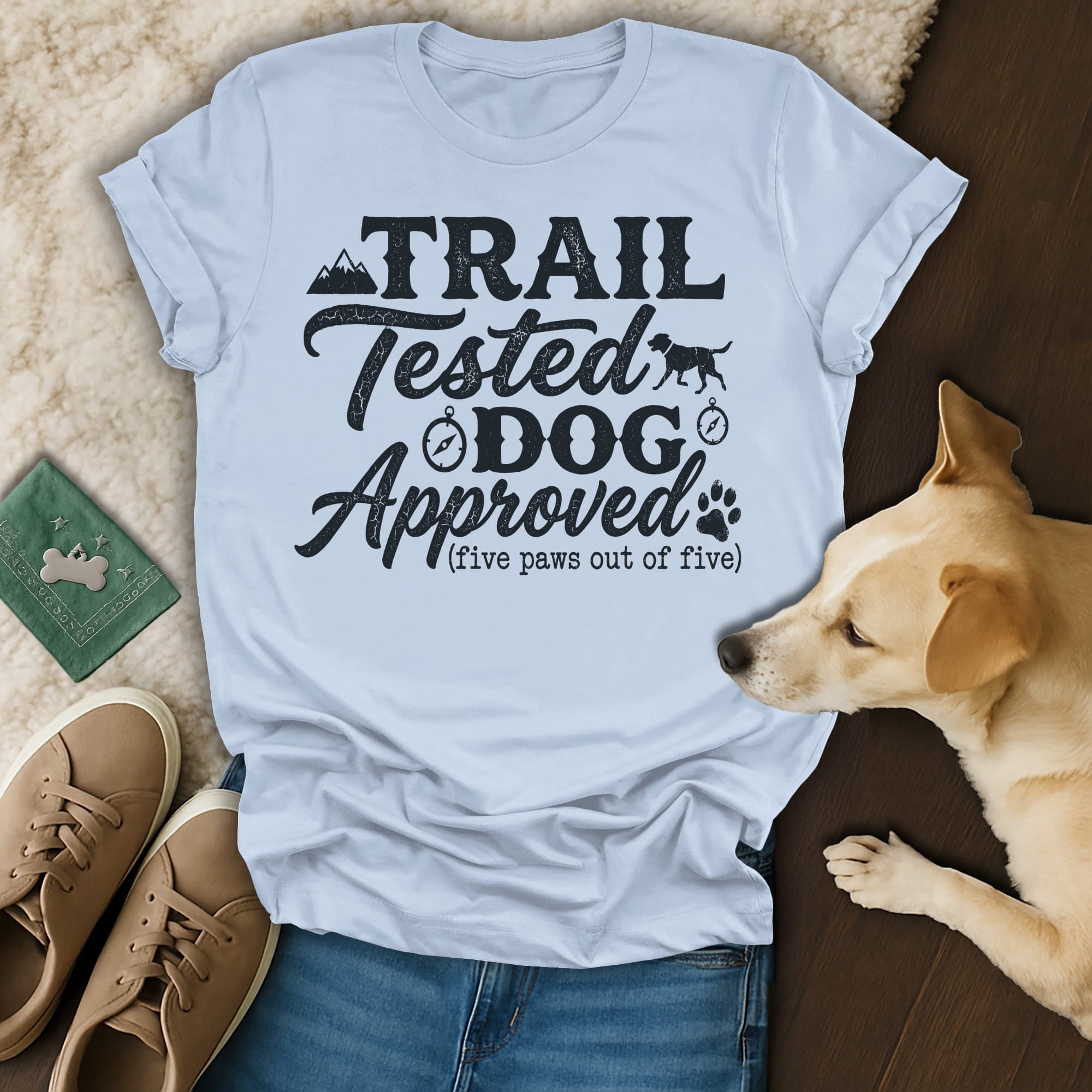 Light blue t-shirt with "Trail Tested Dog Approved" text and paw prints.