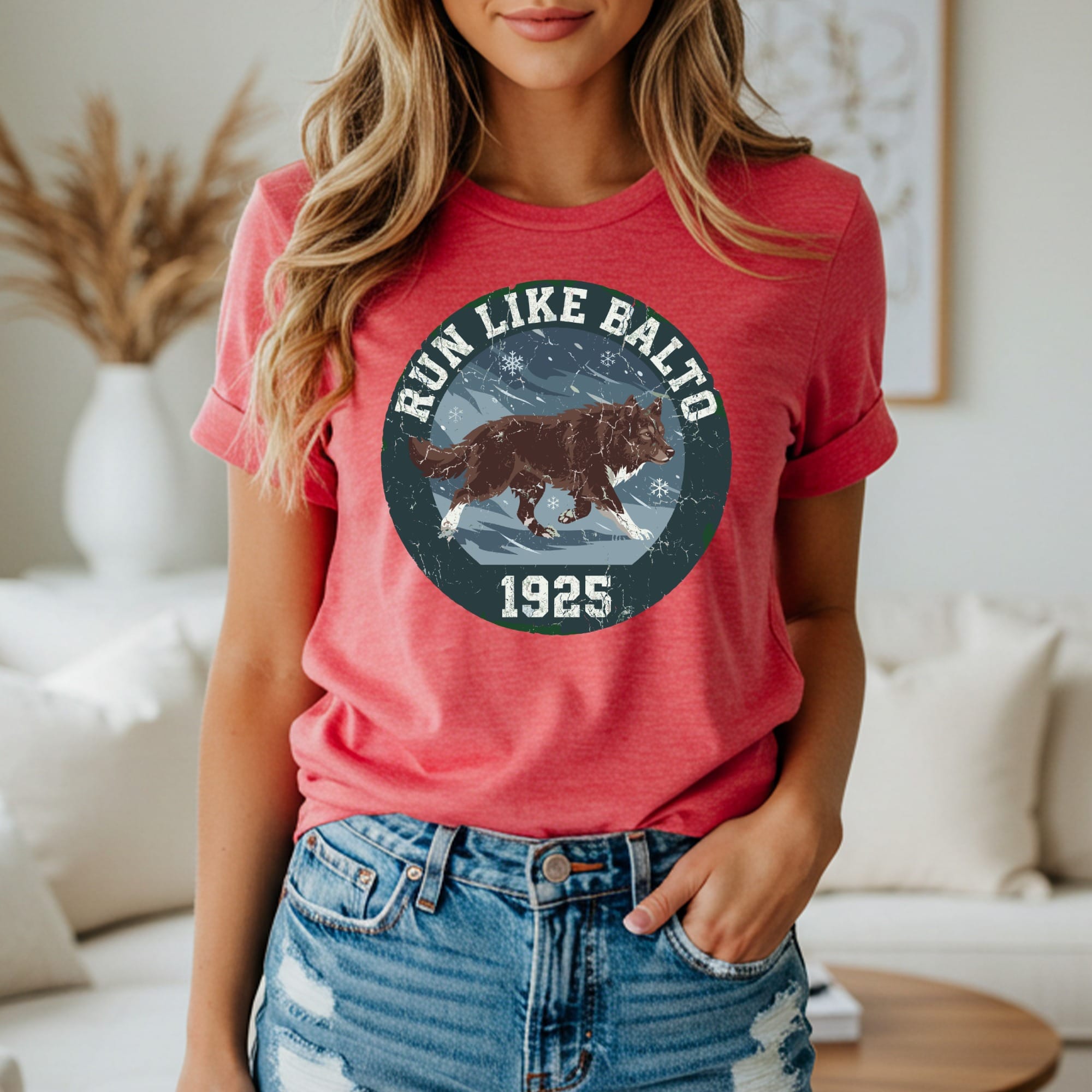 Red t-shirt with "Run Like Balto 1925" and a running husky graphic.
