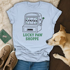 Light blue t-shirt with slot machine graphic and "Lucky Paw Shoppe" text.