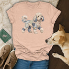 Peach t-shirt with a fluffy dog graphic wearing patchwork denim clothing.