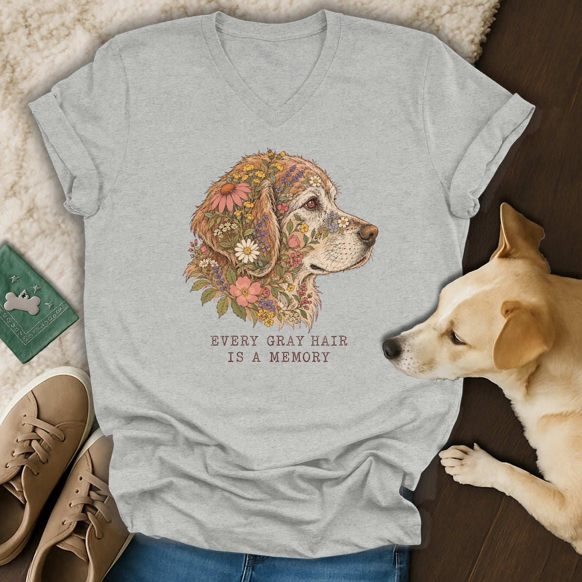 Heather gray v-neck t-shirt featuring a golden retriever graphic with flowers and text reading every gray hair is a memory.