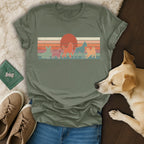 Retro silhouette dog graphic on a vintage-style t-shirt.