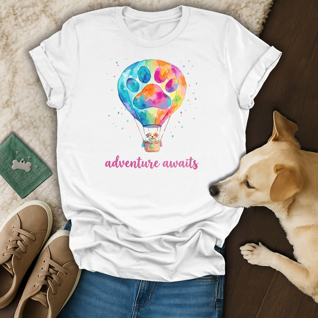 White t-shirt with watercolor hot air balloon, dog, and text "adventure awaits".