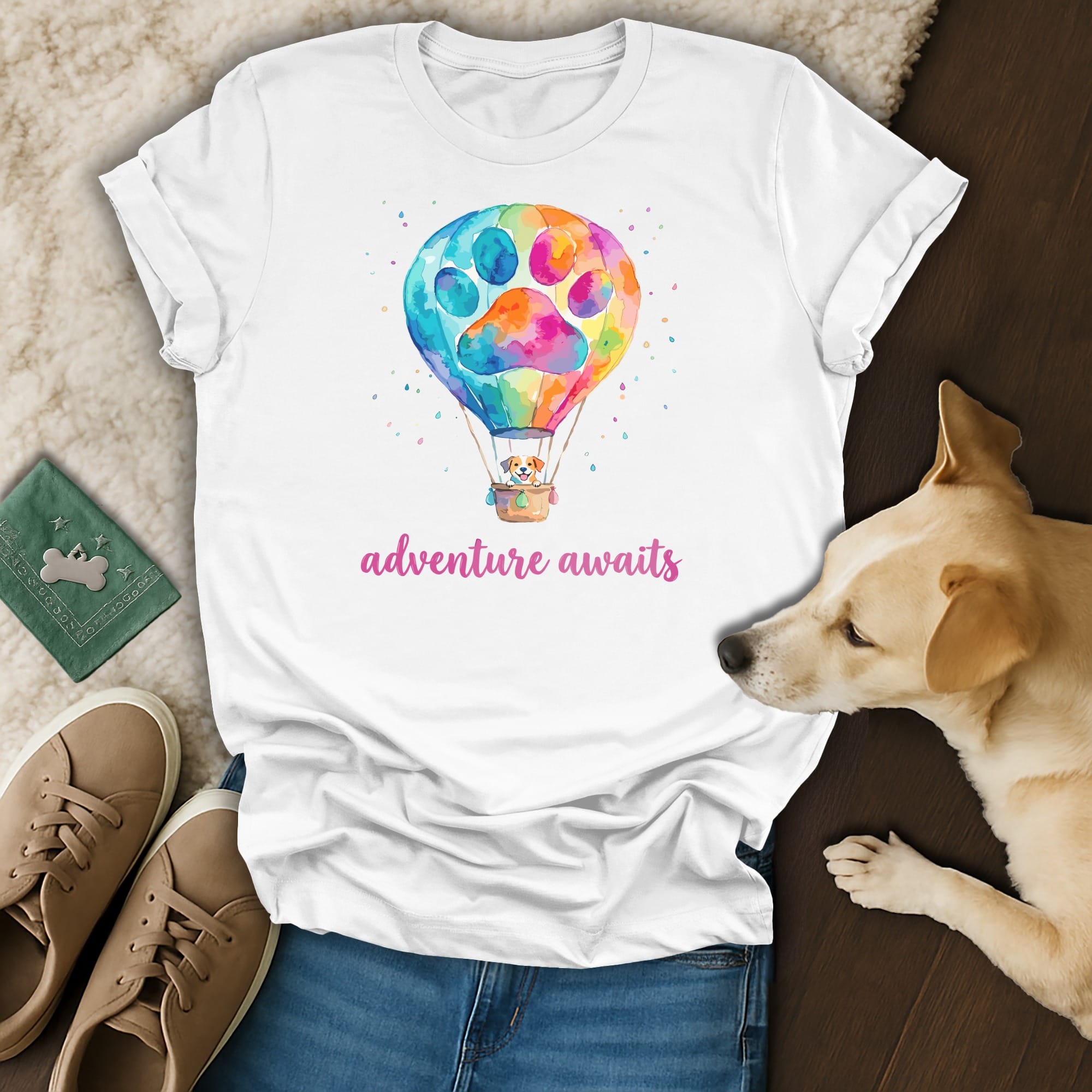 White t-shirt with watercolor hot air balloon, dog, and text "adventure awaits".