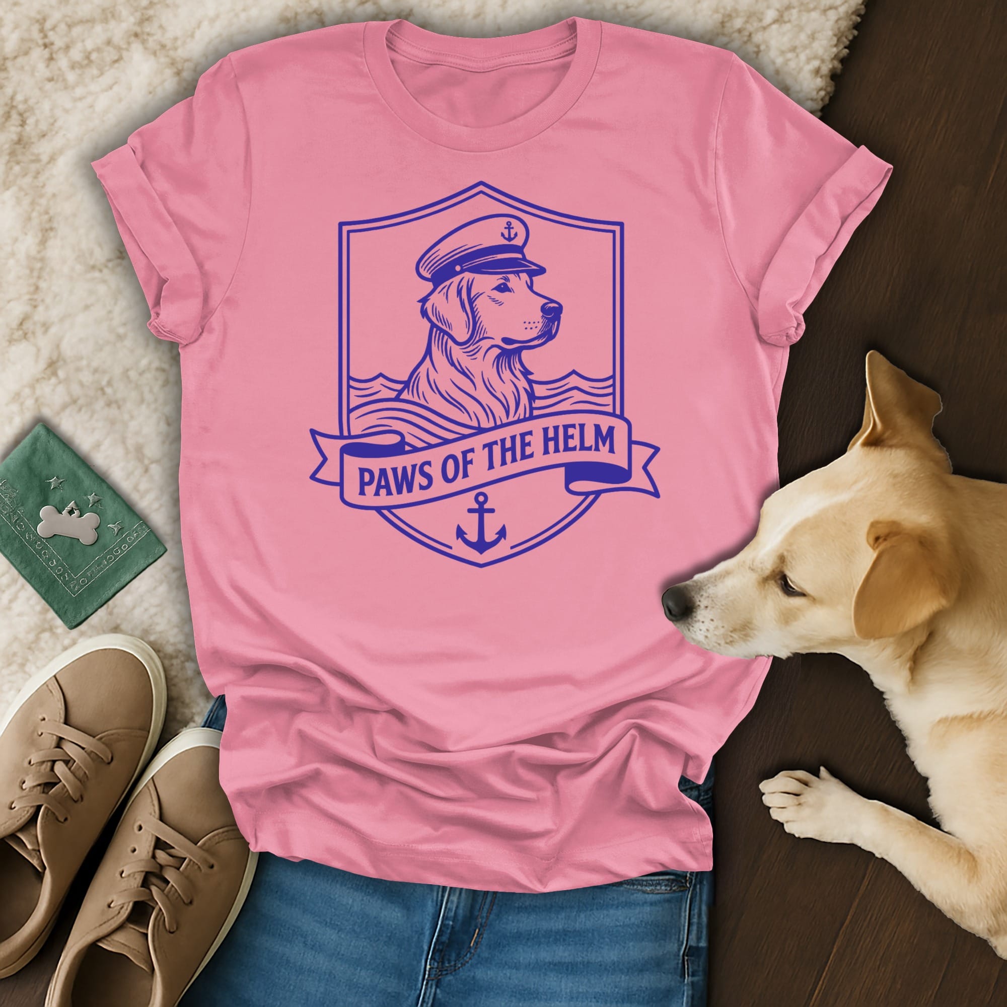 Pink t-shirt with a dog wearing a captain's hat and the text "Paws of the Helm".