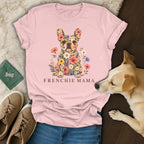 A pink t-shirt with a floral French Bulldog illustration and the text Frenchie Mama.