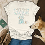 Cream t-shirt with "All I Need Is The Beach" text and a blue dog graphic.