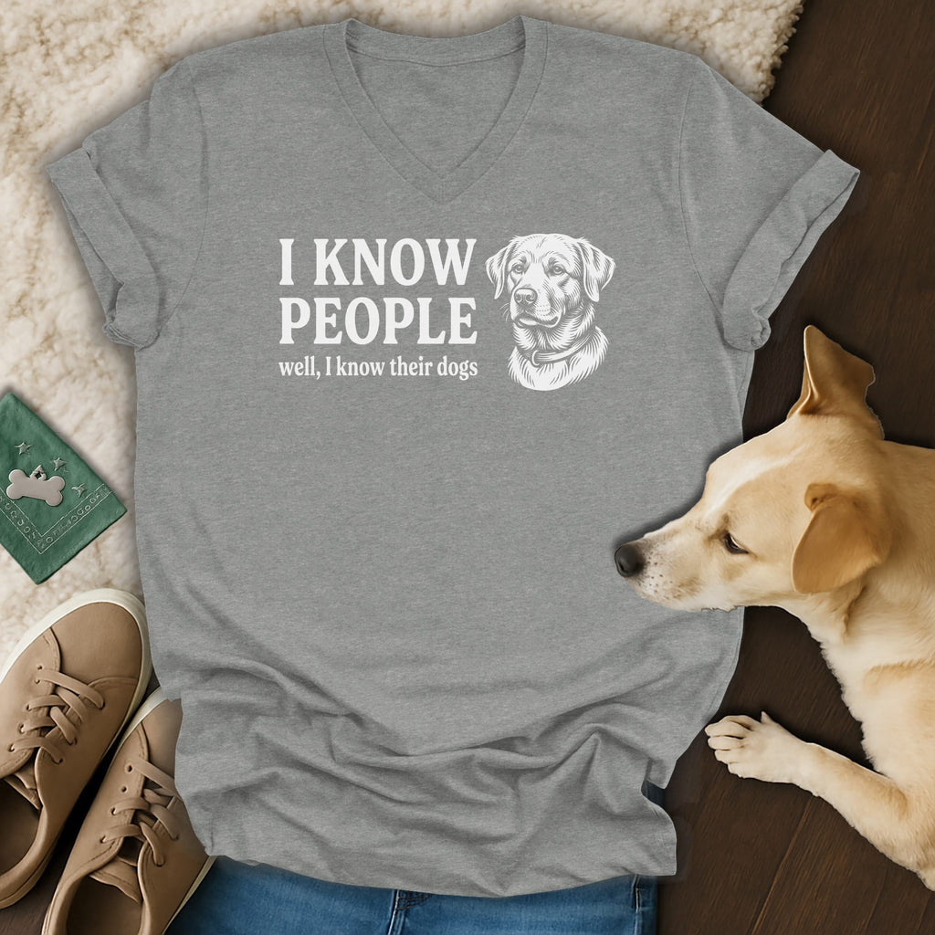Grey v-neck t-shirt with "I KNOW PEOPLE well, I know their dogs" and dog illustration.