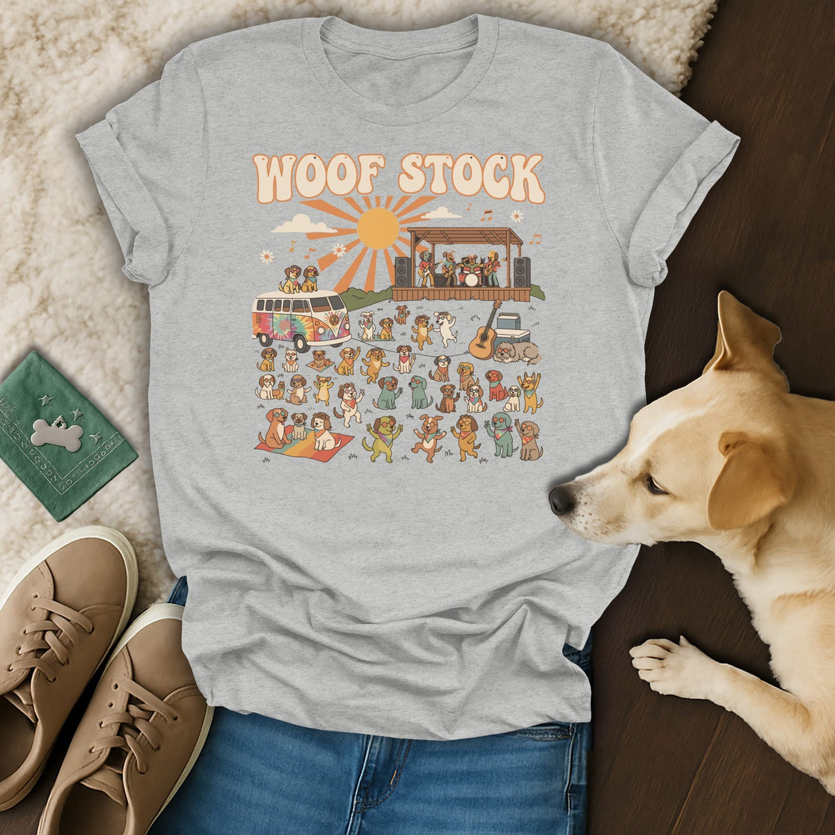 Grey t-shirt with "Woof Stock" text and dogs playing at a music festival.