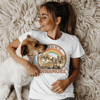 Woman wearing a t-shirt with dogs and "Barkmore" text.