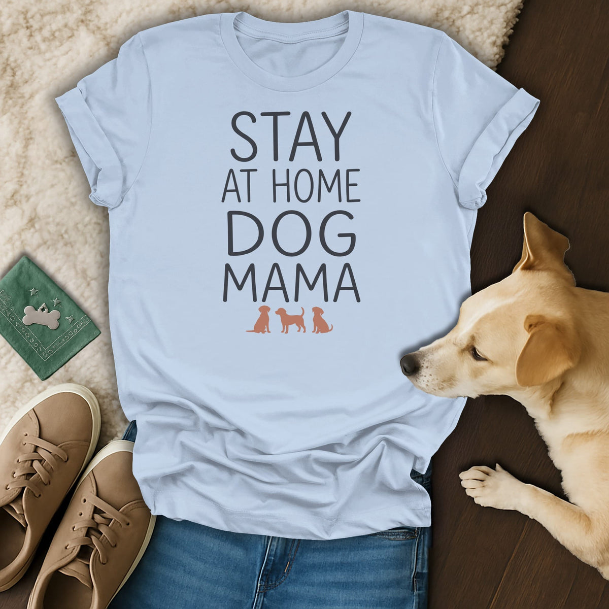Light blue t-shirt with "STAY AT HOME DOG MAMA" text and three dog silhouettes.
