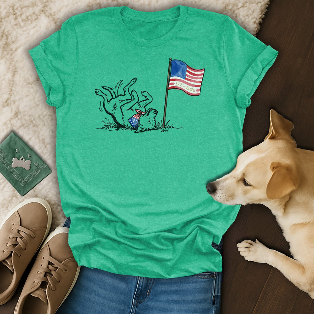 T-shirt with a dog rolling near an American flag and "1776-2026".