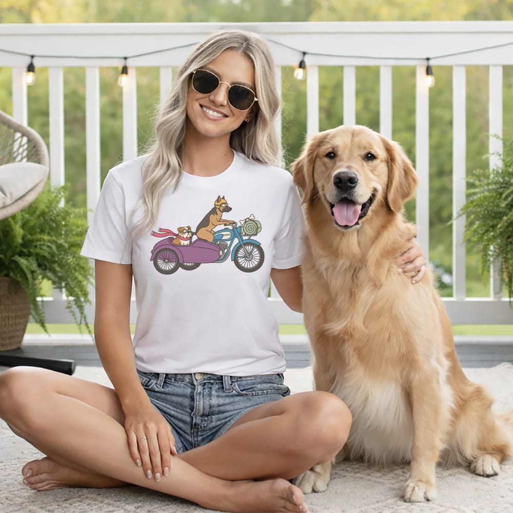 White t-shirt with graphic of dogs on a motorcycle sidecar.