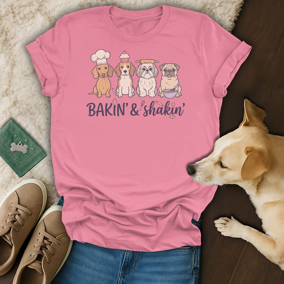 Pink t-shirt with dogs wearing baking accessories and text "BAKIN' & shakin'".