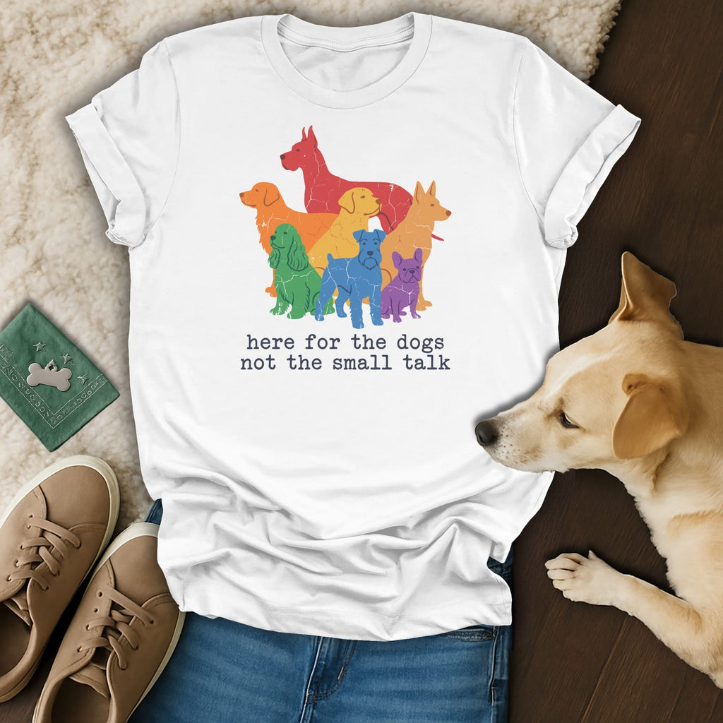 White t-shirt with colorful distressed dog illustrations and text.