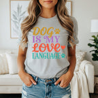Grey t-shirt with "Dog is my love language" text and paw prints.