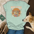 T-shirt with "Woof Stock" text, dogs, and a van with a retro design.