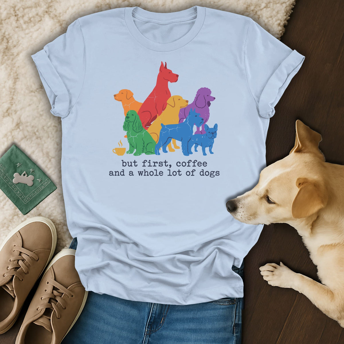 Light blue t-shirt with colorful dog graphic and text.