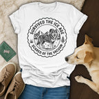 White t-shirt with wolf and mountains graphic reading "Survived the Ice Age Scared of the Vacuum."