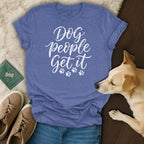 Blue t-shirt with white text "Dog People Get It" and paw prints.