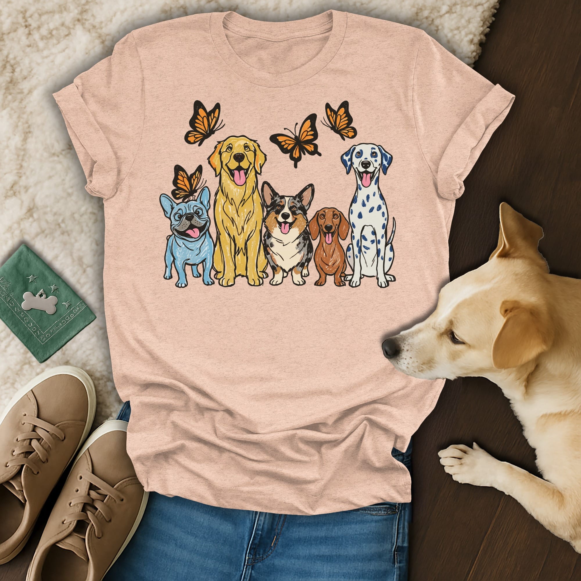 Five dogs in a row, with butterflies above, on a t-shirt.