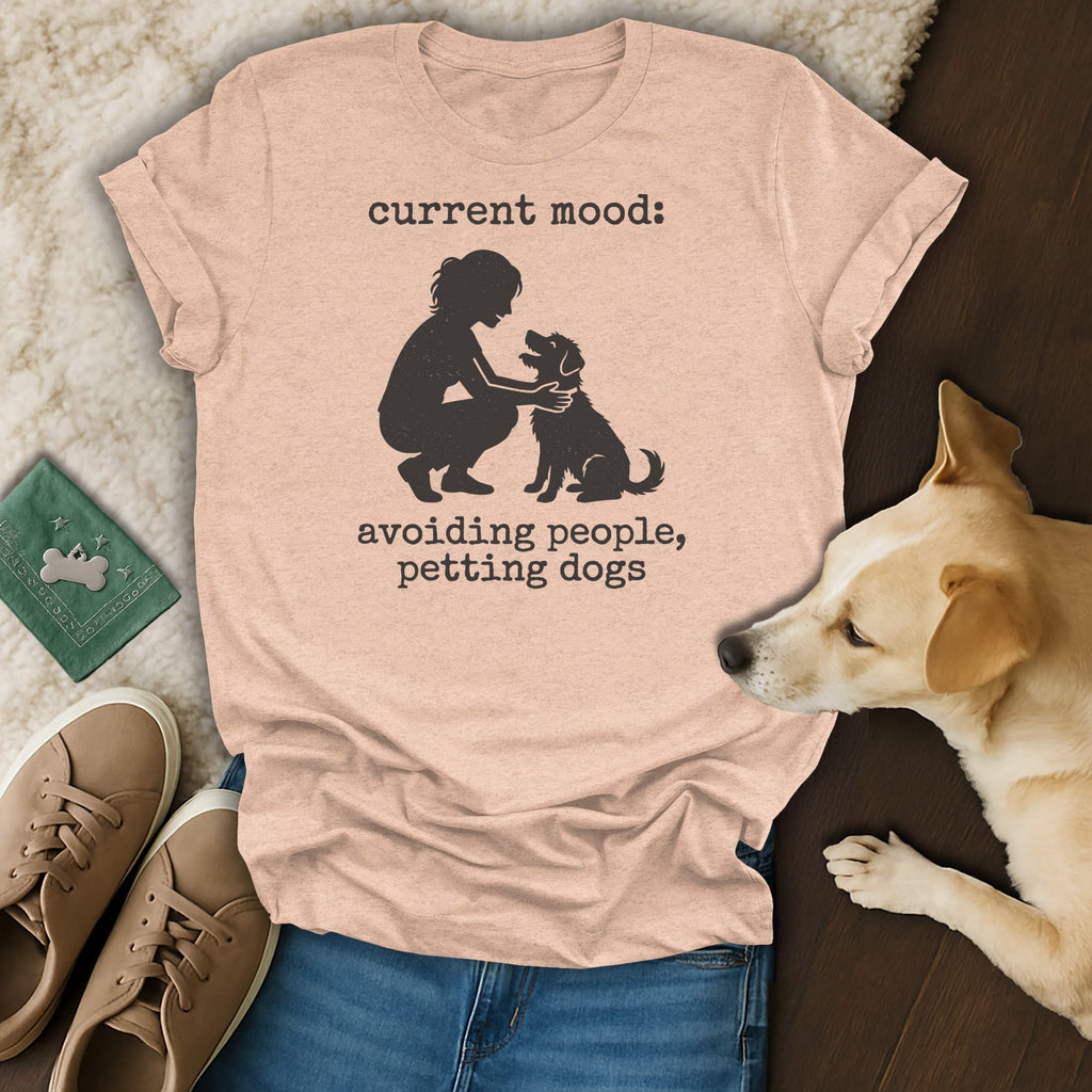 Peach t-shirt with "current mood: avoiding people, petting dogs" and silhouette of person petting dog.