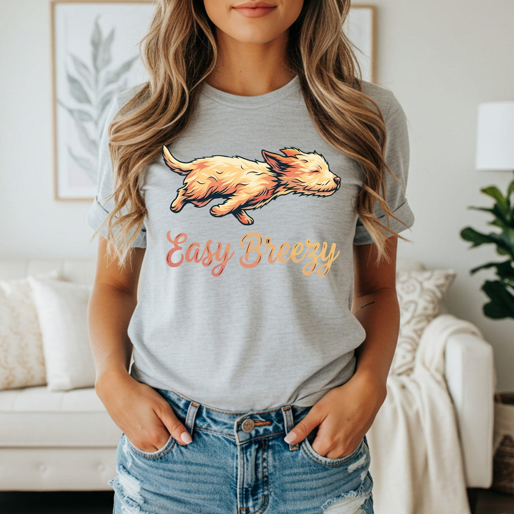 Woman wearing gray t-shirt with "Easy Breezy" text and a cartoon dog.