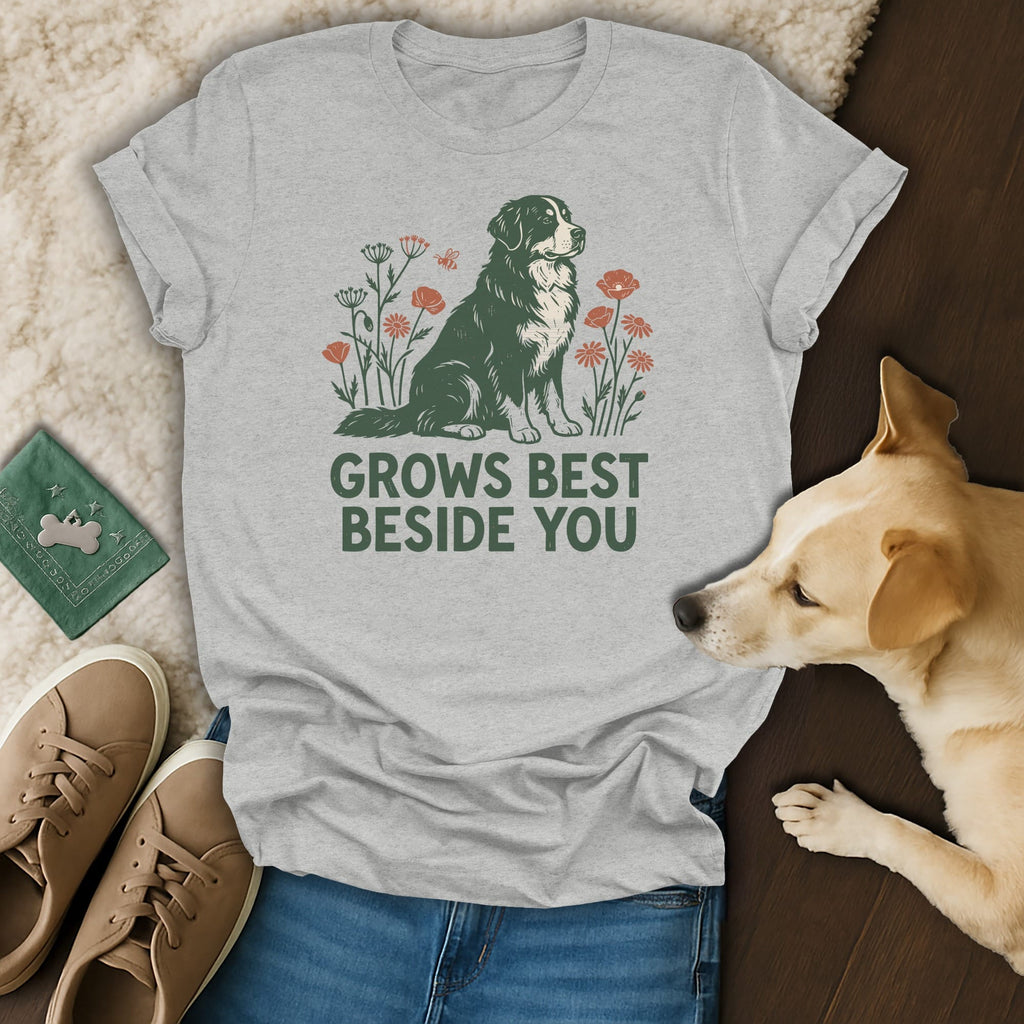 A grey t-shirt featuring a Bernese Mountain Dog graphic and the text GROWS BEST BESIDE YOU.