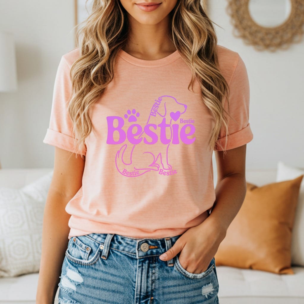 Peach t-shirt with "Bestie" text and dog paw print graphic.