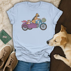 German Shepherd and bulldog riding a motorcycle with sidecar, wearing goggles and scarves.