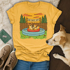 Yellow t-shirt with three corgis in a kiddie pool and text that reads "No Days Off".