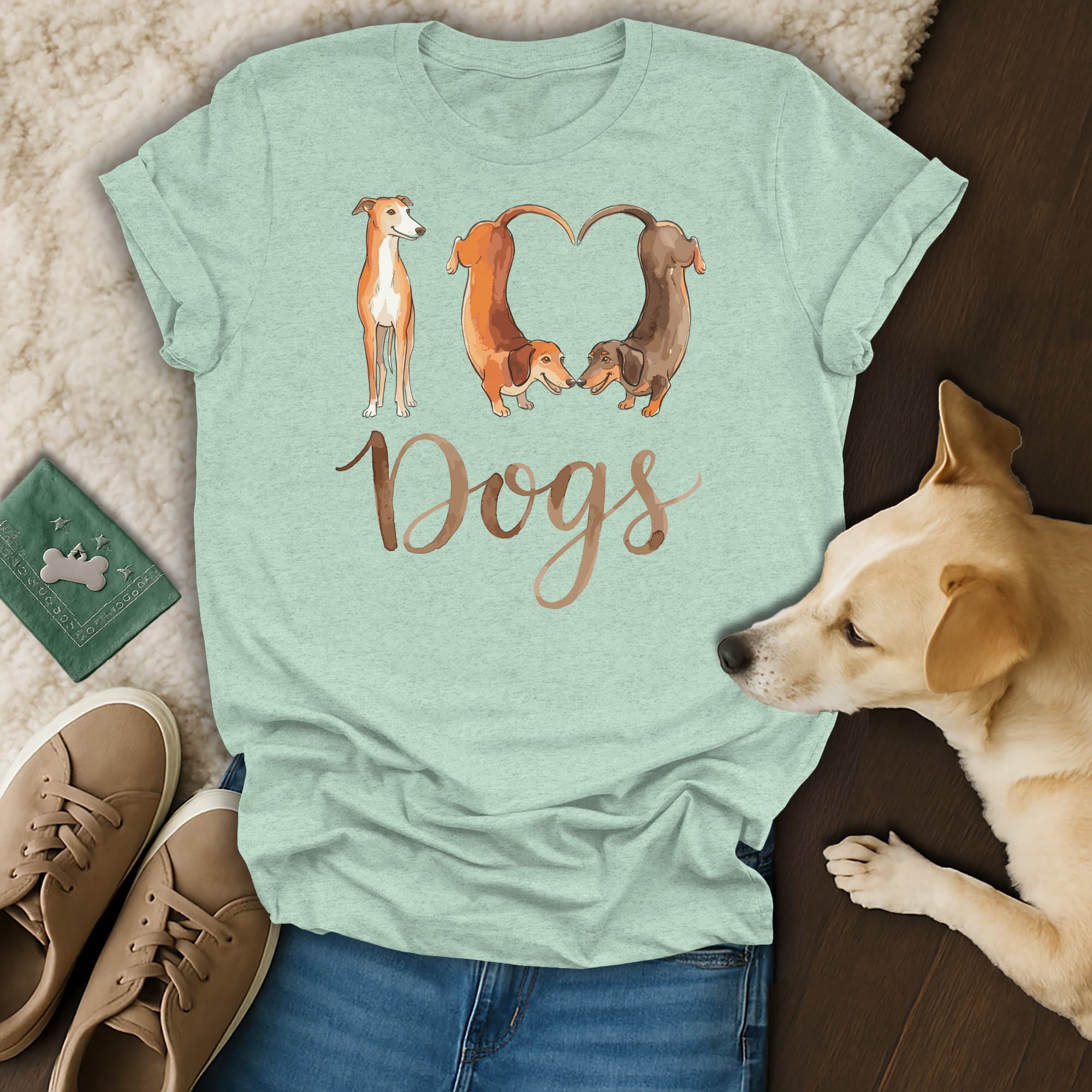 Light mint t-shirt with three dogs and the word "DOGS" in script.