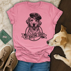 Pink t-shirt with a sketch of a golden retriever in a hat, "MY BOWING SHIRT" text.