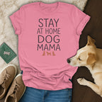 Pink t-shirt with black text "STAY AT HOME DOG MAMA" and dog silhouettes.
