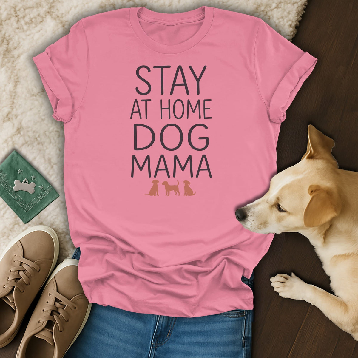 Pink t-shirt with black text "STAY AT HOME DOG MAMA" and dog silhouettes.