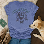 Blue t-shirt with "UNDERDOGS" text and three dogs above a laying dog.