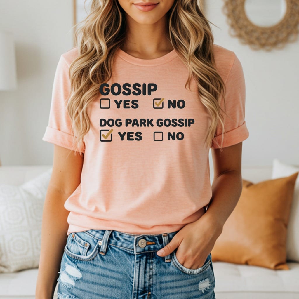 Peach t-shirt with black text reading "GOSSIP YES NO" with "NO" checked, and "DOG PARK GOSSIP YES NO" with "YES" checked.