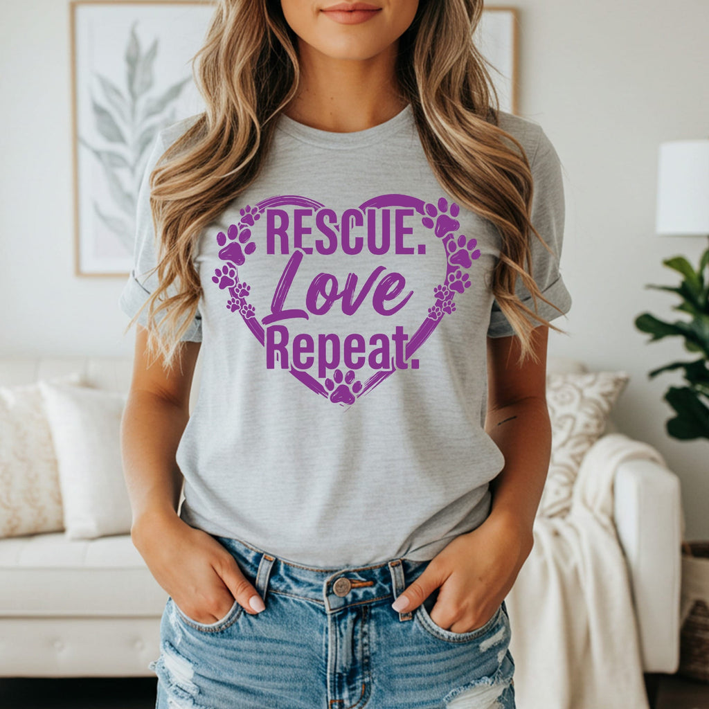 Grey t-shirt with purple paw print heart and text "Rescue. Love. Repeat."