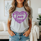 Grey t-shirt with purple paw print heart and text "Rescue. Love. Repeat."