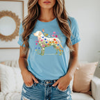Light blue t-shirt with a yellow lab dog silhouette filled with colorful wildflowers.