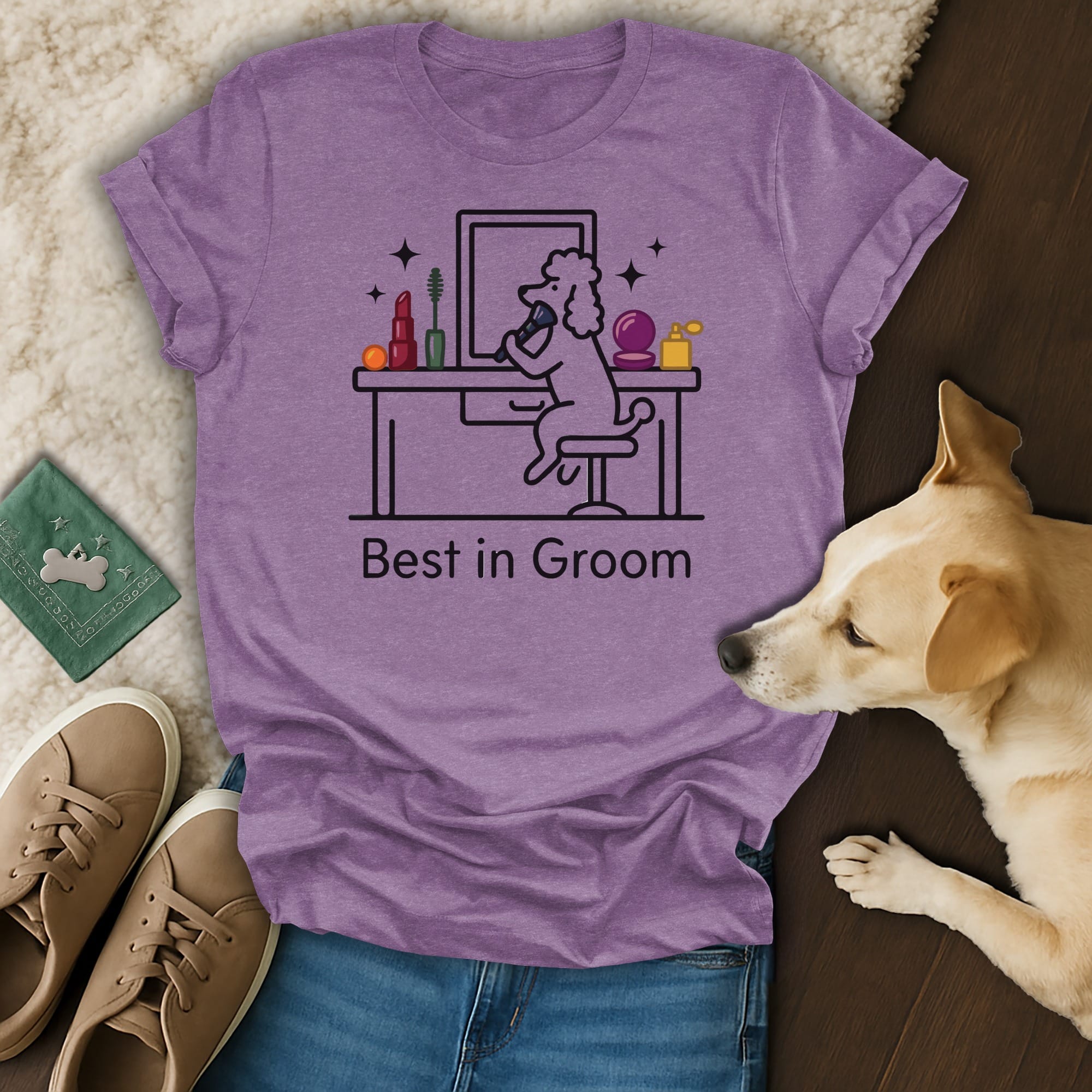 T-shirt with a line drawing of a poodle grooming itself, text "Best in Groom".