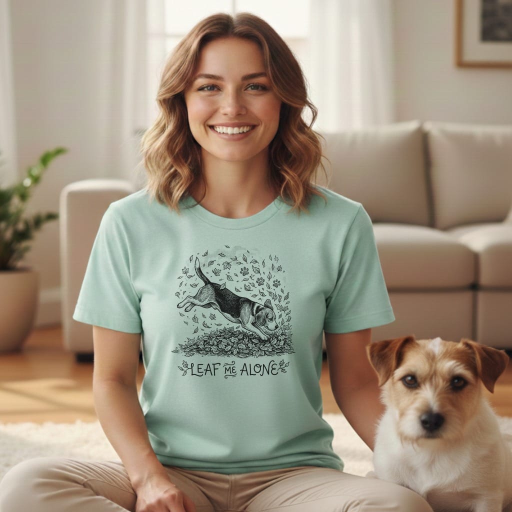 Mint green t-shirt with dog illustration and "Leaf Me Alone" text.