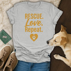Gray t-shirt with "RESCUE. Love. Repeat." and a paw print heart.