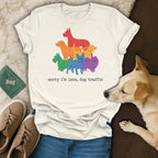 Cream t-shirt with rainbow dogs and "sorry i'm late, dog traffic" text.