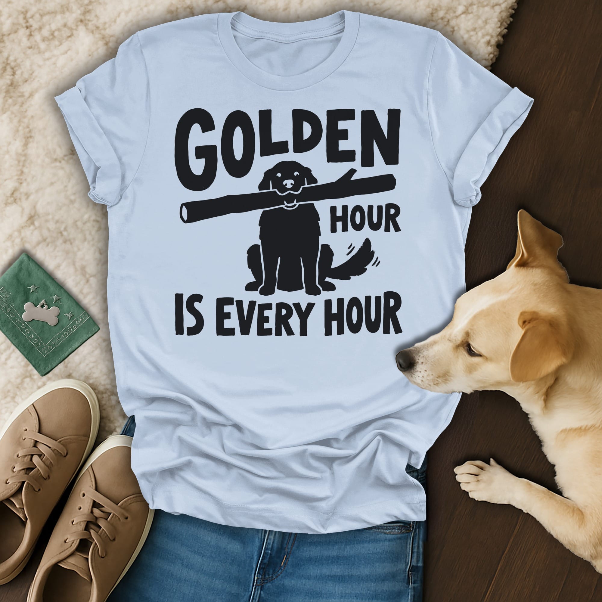 Light blue t-shirt with "GOLDEN HOUR IS EVERY HOUR" and a dog holding a stick.