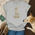 Gray t-shirt with gold dog and moon graphic reading "my therapist says WOOF."