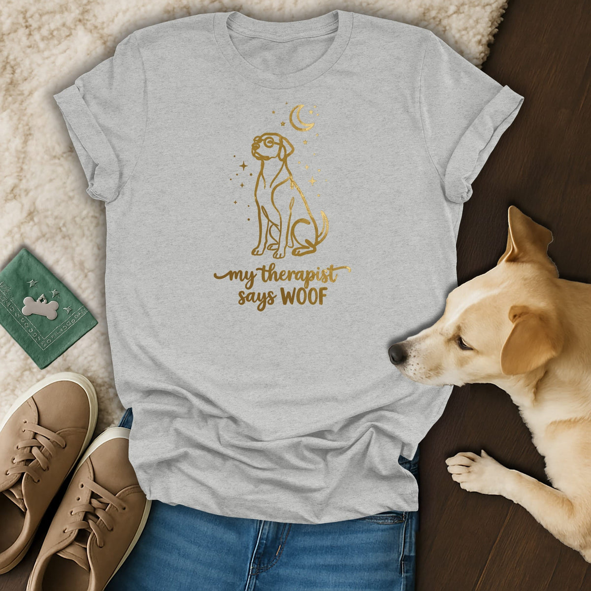 Gray t-shirt with gold dog and moon graphic reading "my therapist says WOOF."