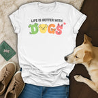 White t-shirt with "Life is Better with Dogs" text and cartoon dog faces.