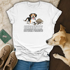 White t-shirt with a beagle dog and dirt graphic, text "Currently Between Projects".