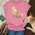 Pink t-shirt with a golden retriever profile filled with various colorful flowers.